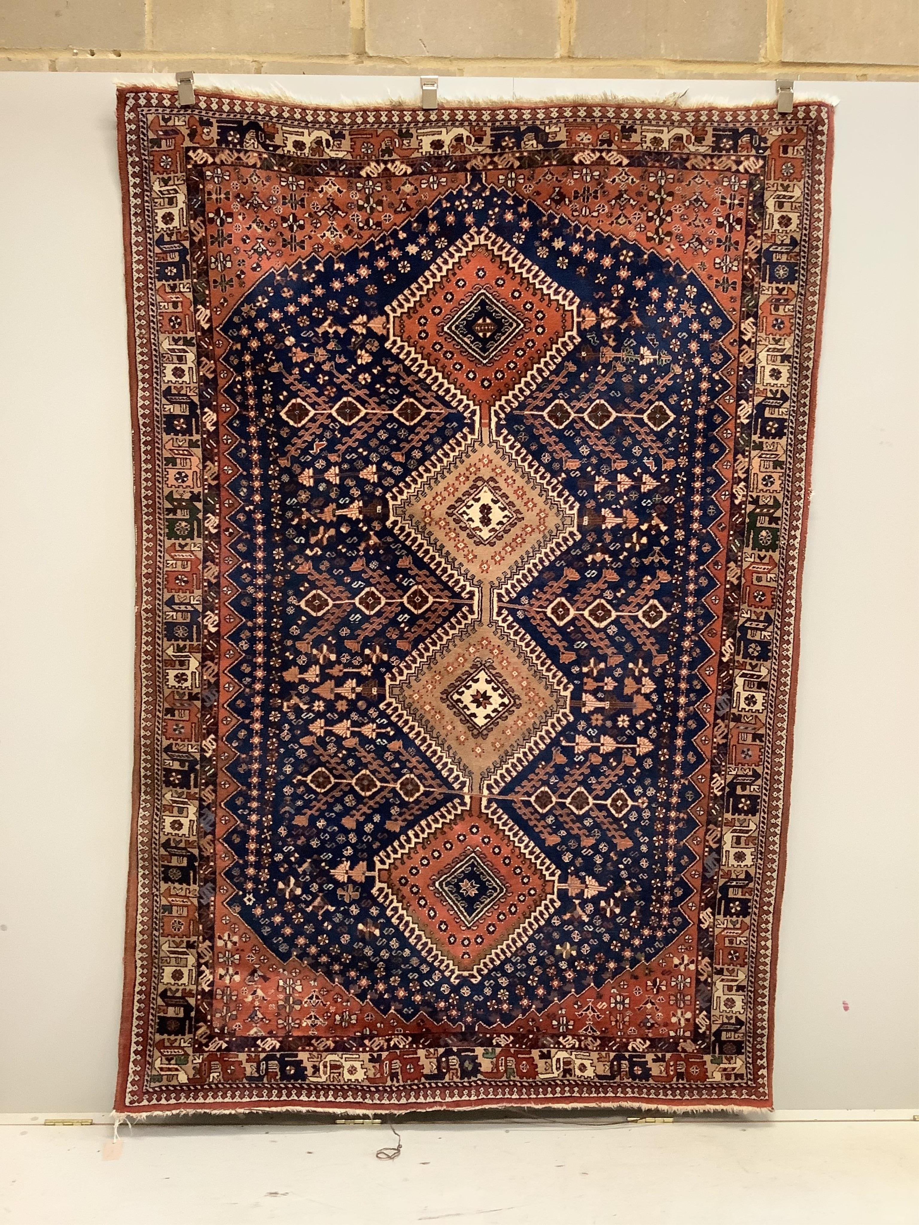 A North West Persian Yalameh blue ground rug, 226 x 151cm. Condition - fair